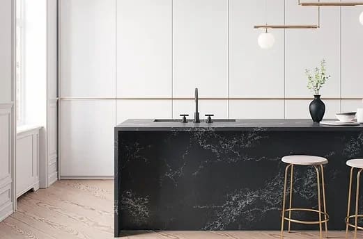 Modern kitchen showcasing Caesarstone Empira Black quartz worktops for a cohesive and stylish design.